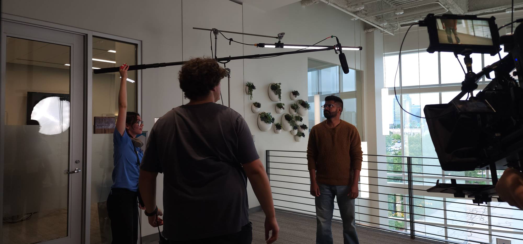 Students staging a scene to begin filming.